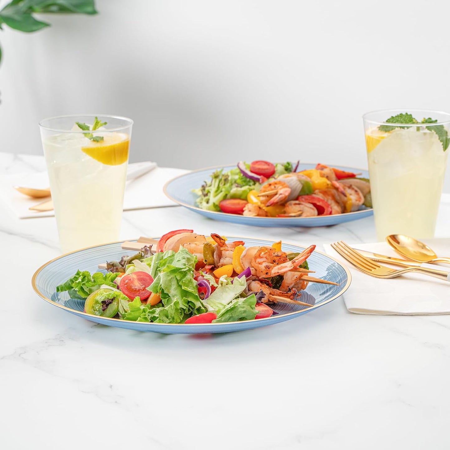 Restaurantware Plastic Plates 100 Pcs 10" Gold Rimmed Disposable Plates Heavy-Duty Blue Translucent Rippled Plastic Dinner Servers for Party, Weddings, Salads, Desserts, and Appetizers