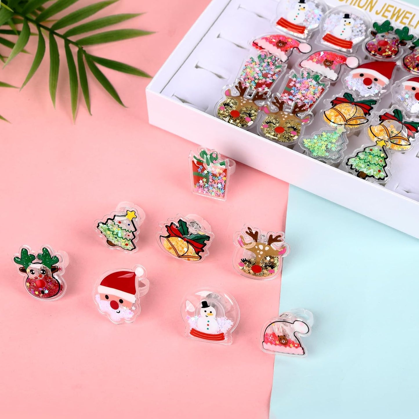 TUWUNA Christmas Party Favors 24 Pcs Glitter Christmas LED Light Up Rings Glowing Finger Rings Toys for Party Supplies Classroom Prizes Pinata Goodie Bag Stocking Stuffers Gifts