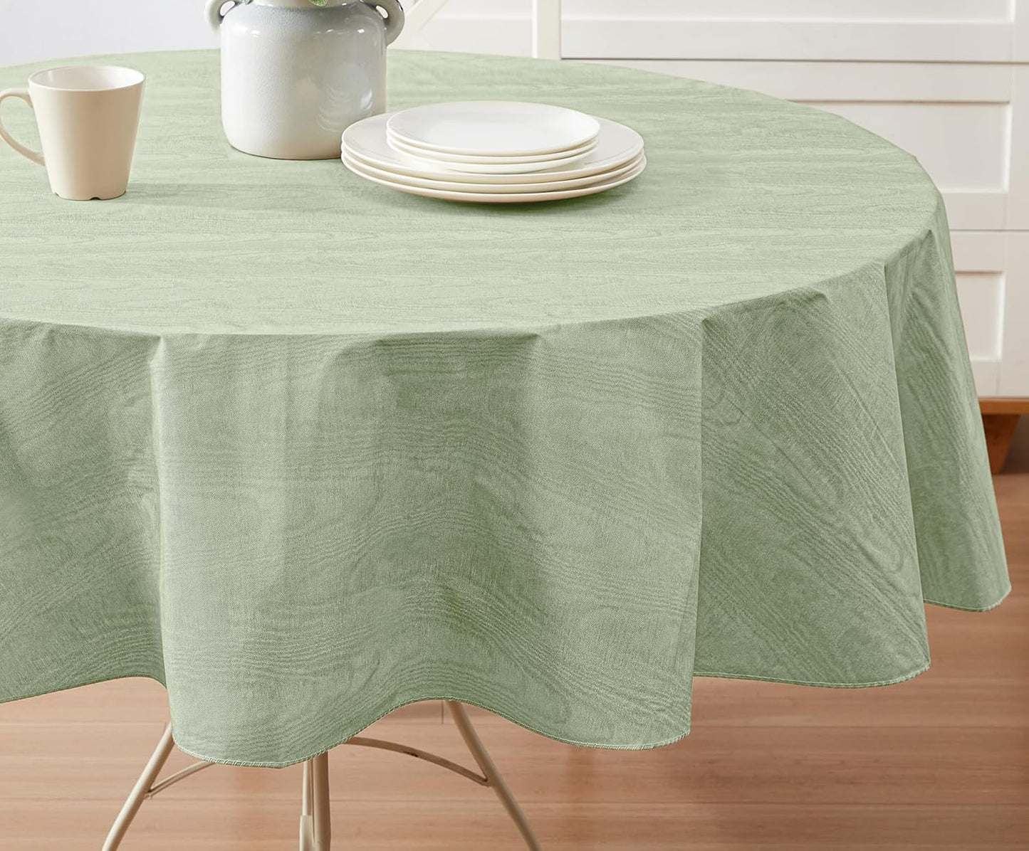 Newbridge Vinyl Flannel Backed Tablecloth, 70 inch Round, Sage Green Moire Wavy Solid Design, Heavyweight Indoor Outdoor Waterproof Table Cover, Easy Care Wipe Clean