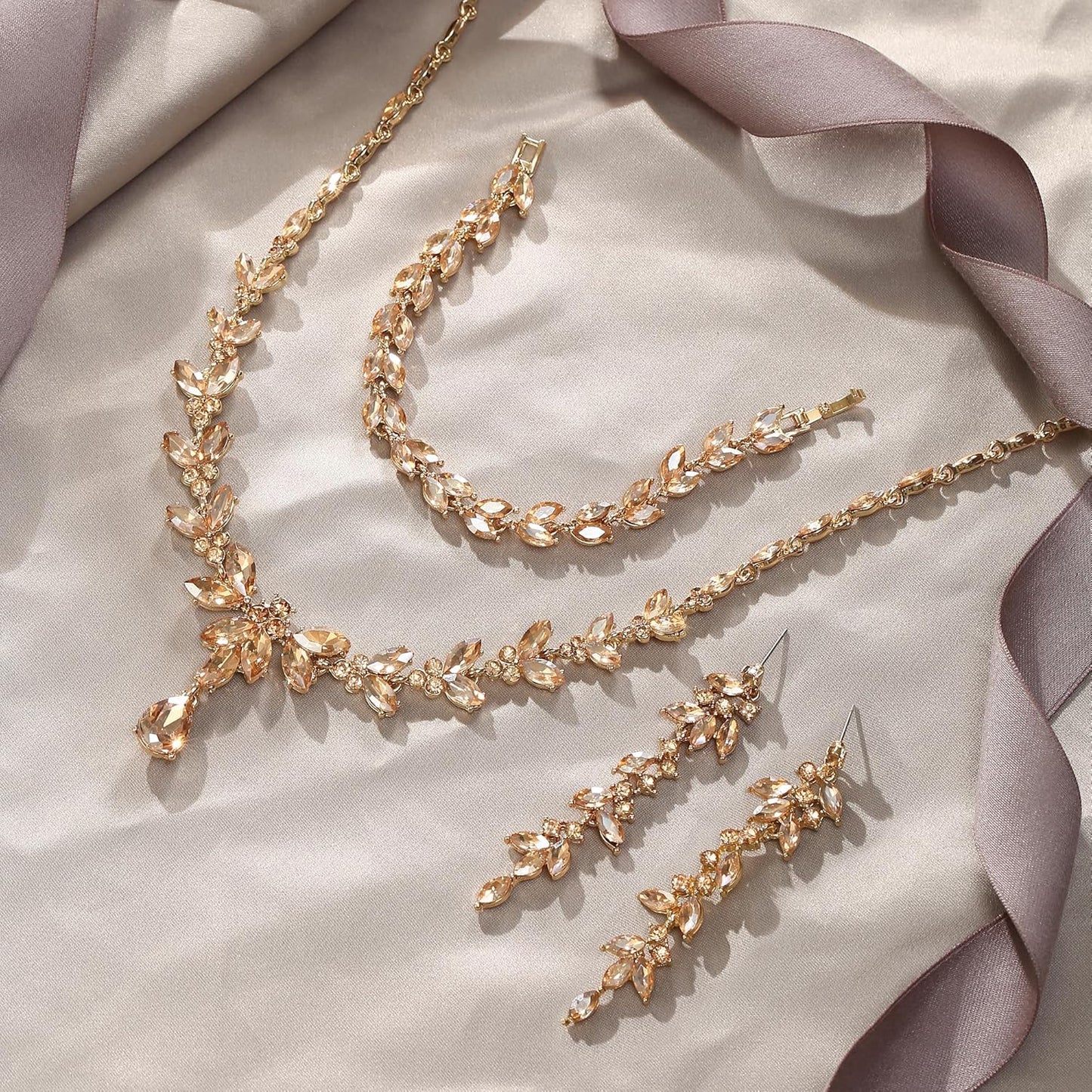 EVER FAITH Austrian Crystal Bridal Bridesmaid Jewelry Sets, Elegant Marquise Rhinestone Leaf Necklace Dangle Earrings Tennis Bracelet Set for Women